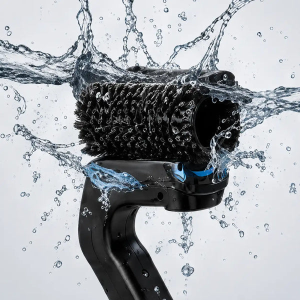 Removable BBQ brush attachment being cleaned